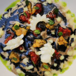 Risoni, fegato di seppia e pomodori confit