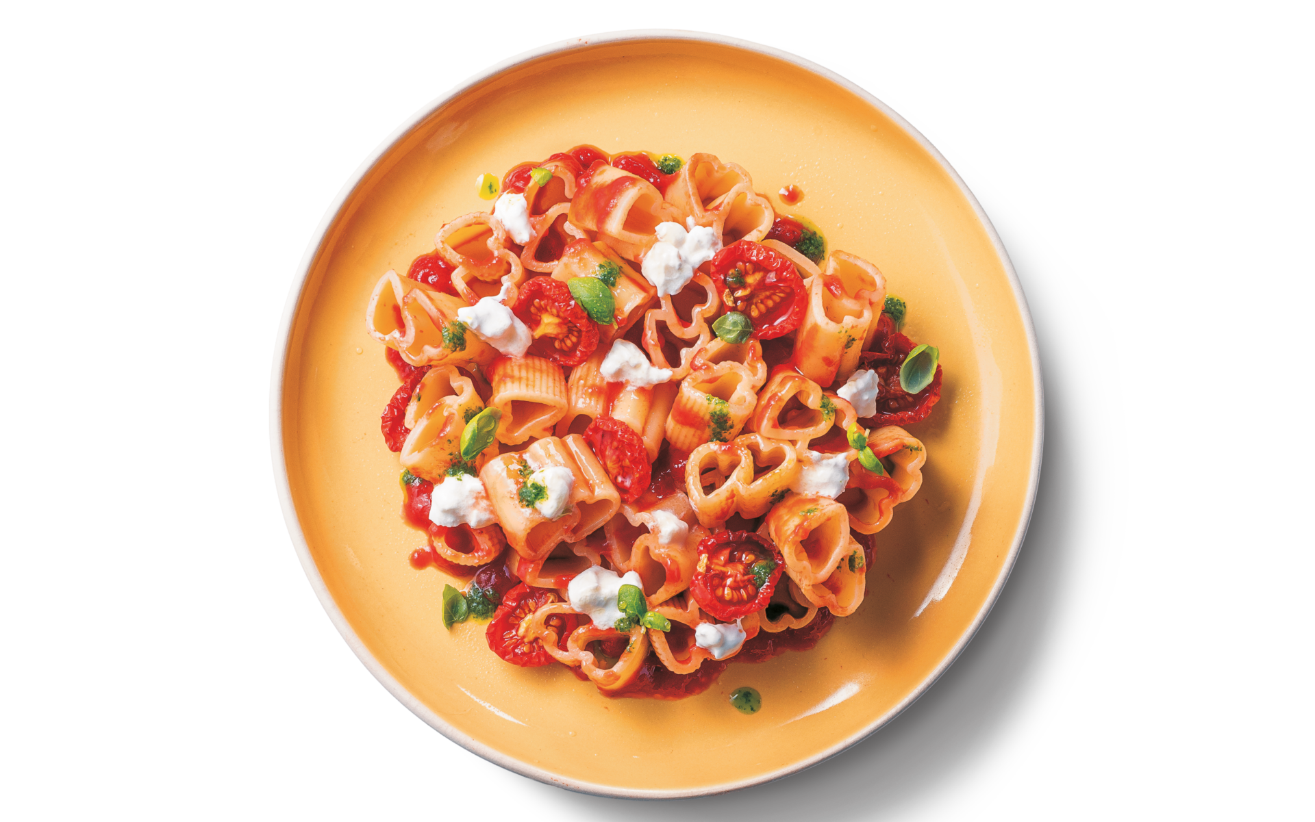pasta con crema di pomodoro confit, olio al basilico, agrumi e burrata