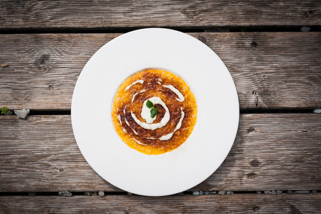 risotto zucca, provolone e polvere di liquirizia