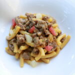 Sedanini freschi con ragù di selvaggina e pompelmo