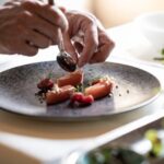 Trota marinata al finocchietto, lamponi, yogurt naturale, amaranto soffiato